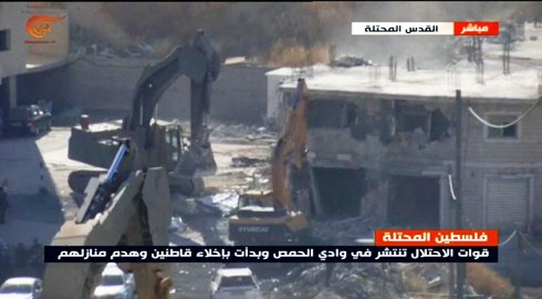الصورة من البث المباشر للميادين ويظهر هدم المنازل في وادي الحمص بالقدس المحتلة